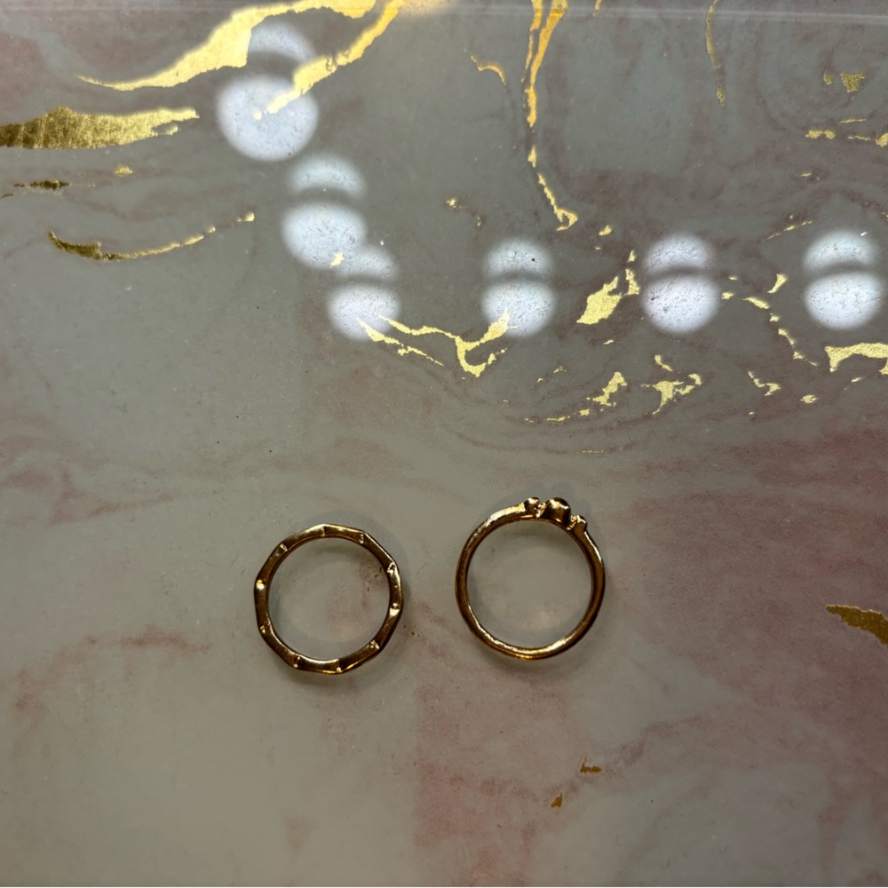 2 simple gold tiny and delicate rings